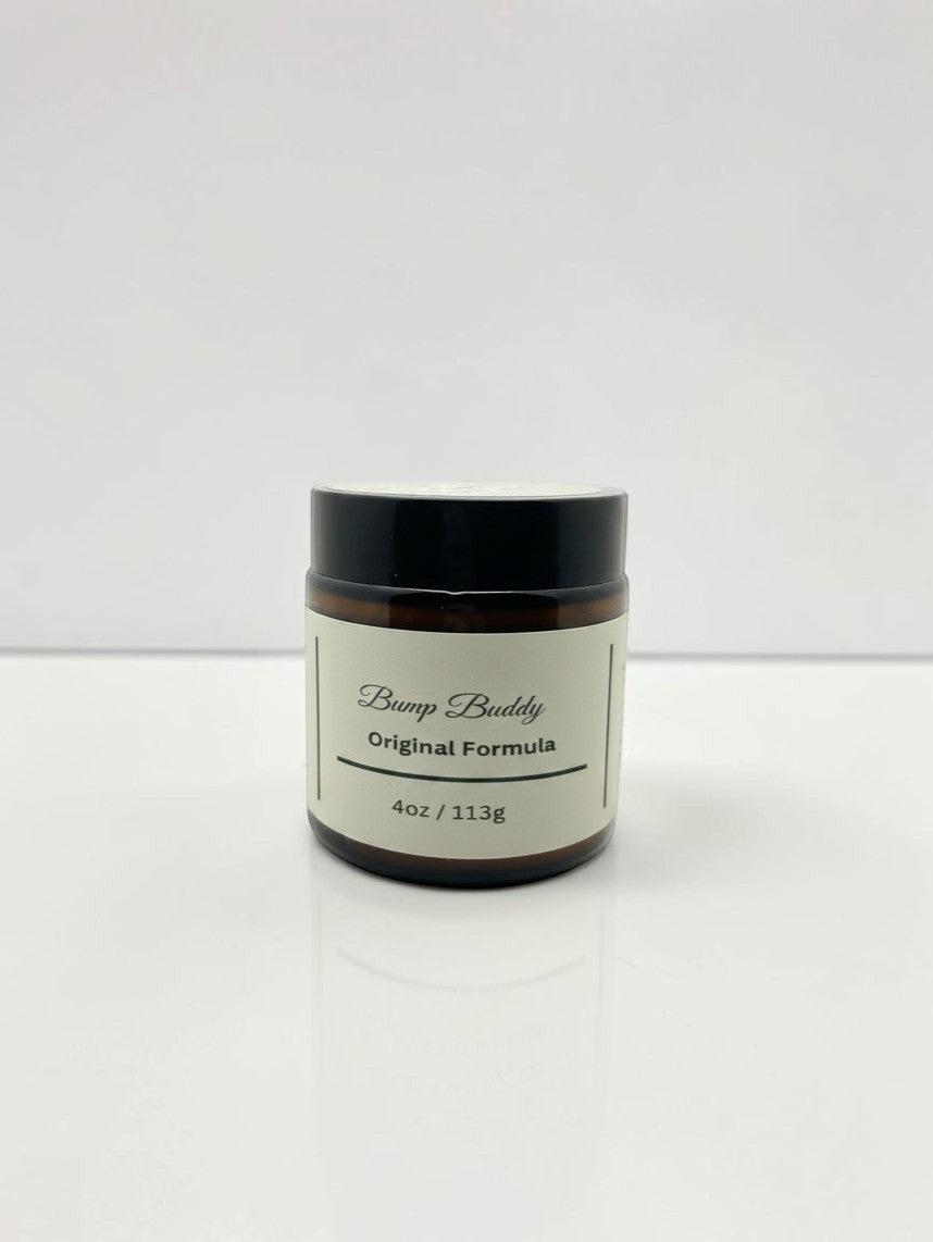 Fjell Dekor Bump Buddy Original Formula 4oz soothing skin balm in an amber glass jar with a black lid.