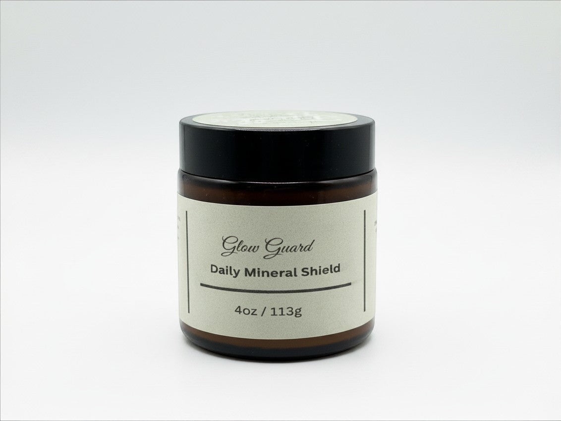 Fjell Dekor Glow Guard 4oz daily mineral shield balm in an amber glass jar with a black lid on a white background.