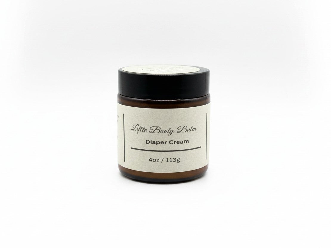 Fjell Dekor Little Booty Balm 4oz diaper cream in a brown glass jar with a minimalist white label.