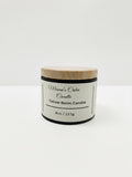 Fjell Dekor Mama’s Calm 4oz tallow balm candle in a black jar with a light wood lid for moisturizing aromatherapy