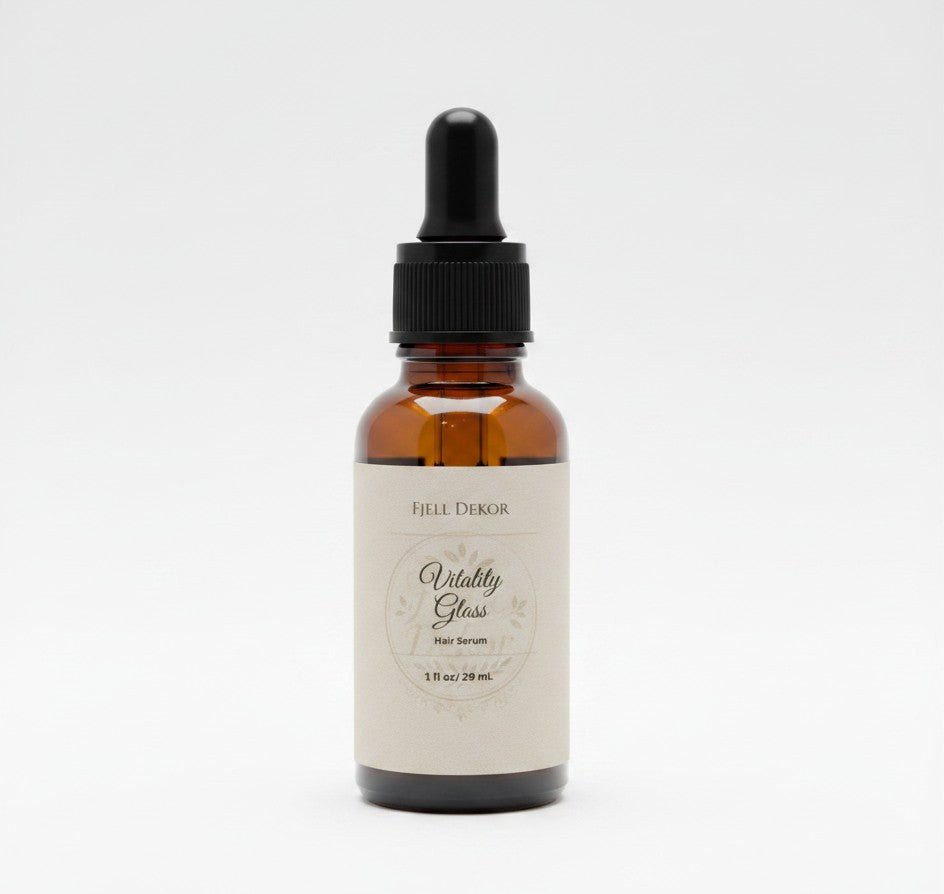 Fjell Dekor Vitality Gloss 1oz hair serum in an amber glass dropper bottle for scalp health and frizz control.